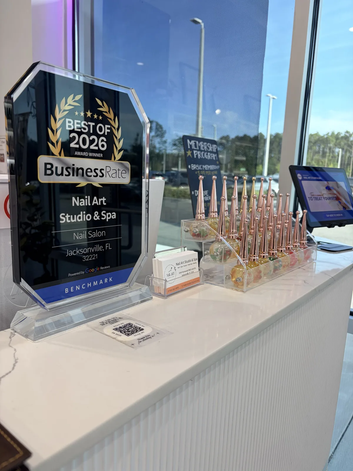 Best of 2026 BusinessRate award displayed at the reception desk